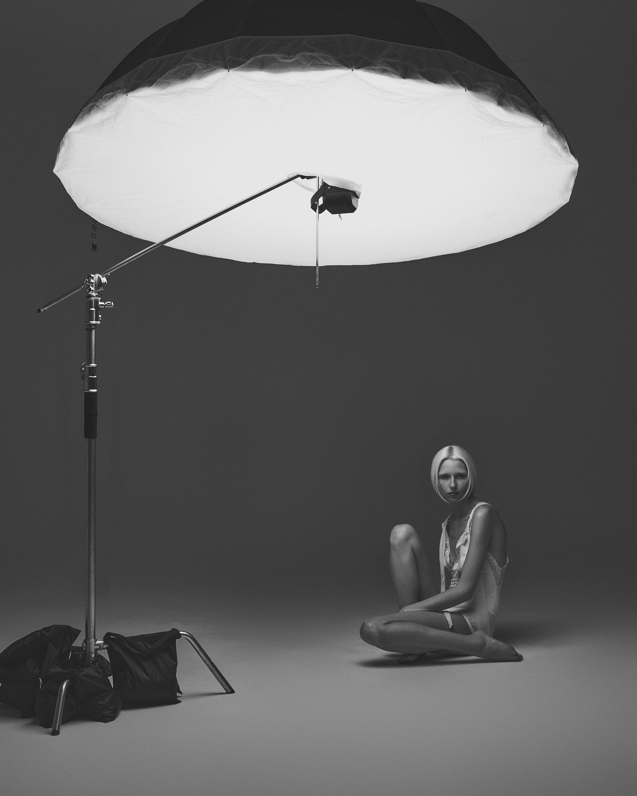 Black and white editorial portrait of model Kalie during studio session in Dallas, Texas